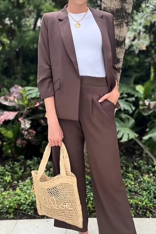 Recycled Shirred Blazer in chocolate brown, full front view with matching wide-leg trousers and woven tote