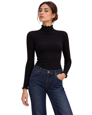 The Gabby Longsleeve Top – in black, front view on model, worn with jeans