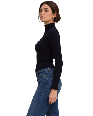 The Gabby Longsleeve Top – in navy, side view