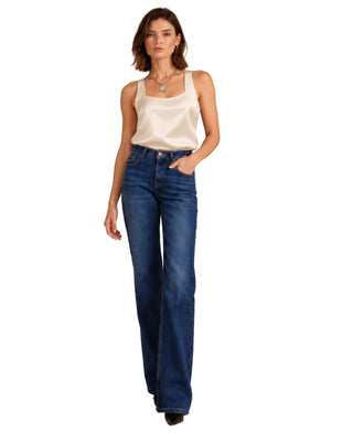 The Elina Silk Top – in ecru, front view on model, worn with jeans