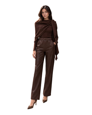 The Rafa Brown Two Piece Scarf Sweater Top – front view on model, sweater with attached scarf, worn with brown leather pants