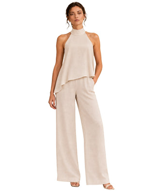 The Ivana Asymmetrical Halter Top and Ivana Drawstring Trousers – front view on model, styled with the matching champagne trousers