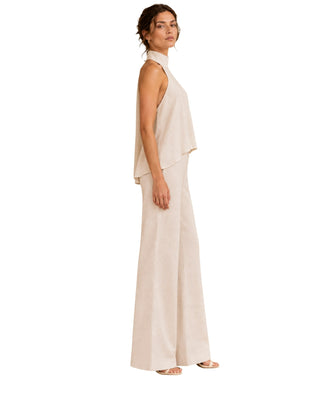 The Ivana Asymmetrical Halter Top and Ivana Drawstring Trousers – side view on model