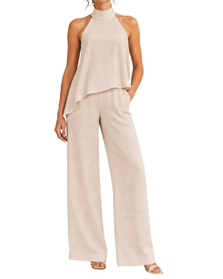 The Ivana Asymmetrical Halter Top and Ivana Drawstring Trousers – front view on model, hand in pocket