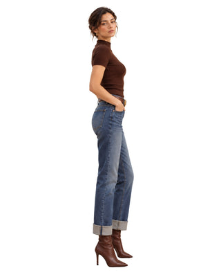 Evelyn Straight Cuffed Jeans in mid-blue wash, styled side view with brown top and boots