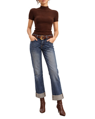 Evelyn Straight Cuffed Jeans in mid-blue wash, closer styled front view with a brown belt and boots