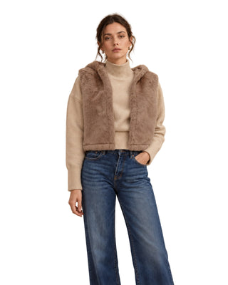 Lara Faux Fur Hooded Vest in sand, front view over a cream knit with wide-leg jeans