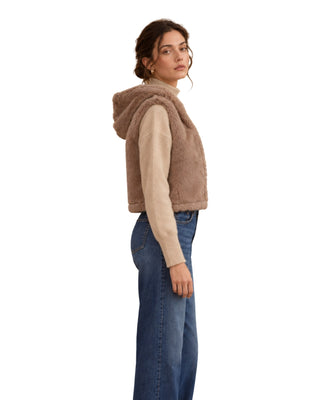 Lara Faux Fur Hooded Vest in sand, side view showing the hood and cropped length