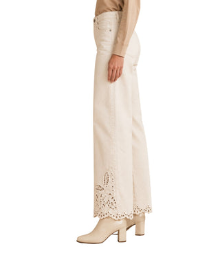 Lili High Waist Embroidered Pants in white, side view of the wide leg and scalloped embroidered hem