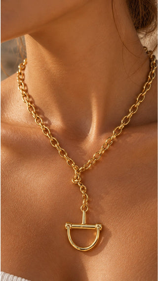 Equestria Pendant Chain Necklace, worn close-up with the knotted gold chain and horse stirrup pendant