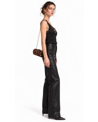 Genesis Modernist Pocket Leather Pants in black, full-length side view with a leopard clutch