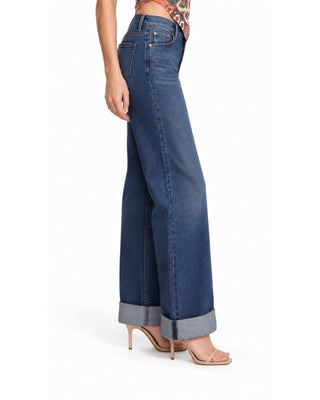 Liz Wide Leg Cuffed Hem Jeans in dark denim, side view with deep rolled cuff over strappy heels