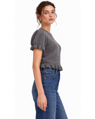 Ruffle Sweater in charcoal, side view with puff shoulder and ruffled hem