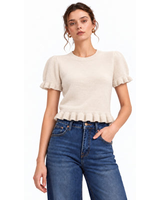 Ruffle Sweater in cream, front view with puff sleeves and ruffled hem, worn with jeans