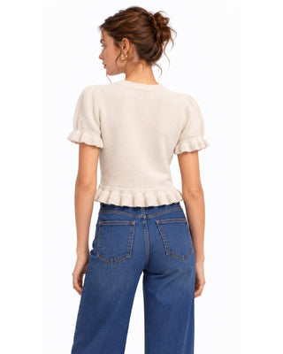 Ruffle Sweater in cream, back view with cropped length and ruffled hem