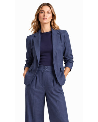 Lauren Denim Blazer in blue denim, front view with notched lapels and pushed-up sleeves, worn over matching wide-leg pants