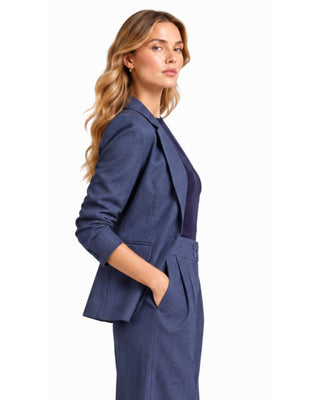 Lauren Denim Blazer in blue denim, side view with hand in pocket and flap pocket at the hip