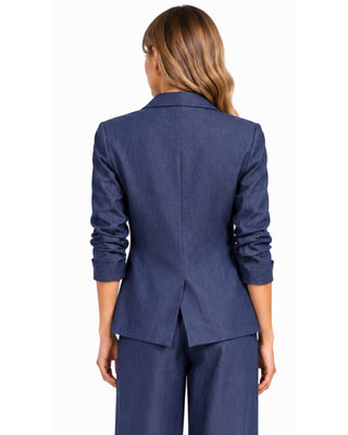 Lauren Denim Blazer in blue denim, back view with a centre vent and ruched sleeves